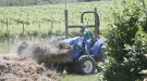 Person driving tractor