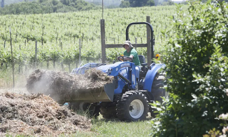 Person driving tractor