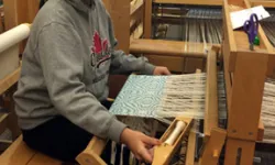 student weaving