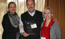 Dan jenkins receiving award