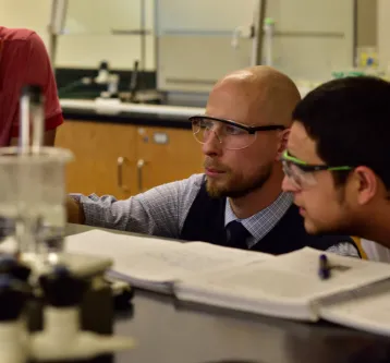 Chemistry Students with scientific equipment