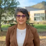 woman in brown jacket