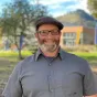 man with hat and glasses